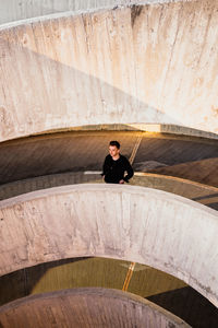 Portrait of man on staircase