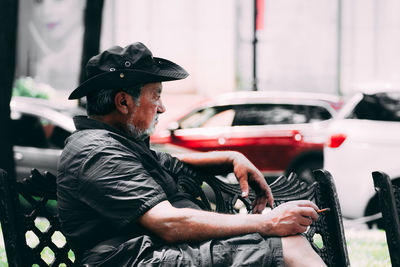 Man sitting in car