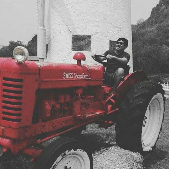 land vehicle, transportation, mode of transport, architecture, building exterior, built structure, red, old, car, day, old-fashioned, outdoors, abandoned, no people, stationary, obsolete, wall - building feature, communication, metal, text