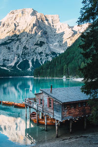 Scenic view of lake by snowcapped mountains