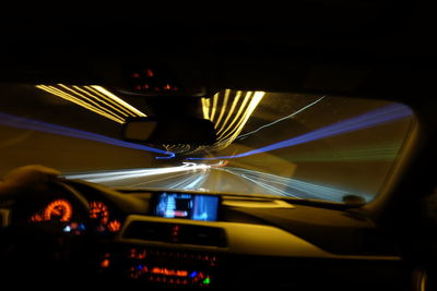 Light trails on road at night