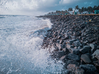 Monsoon gives arabian sea waves extra boost. waves crashing at the coast in kerala