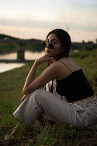 Woman sitting on a field