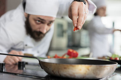 Man preparing food in kitchen