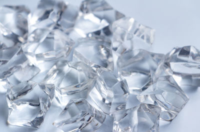 High angle view of crystals on white background