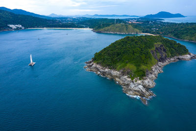 Aerial island view of ko man, thailand. view amazing view to catamaran cruising in open sea 