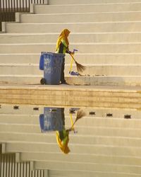 Man working on staircase