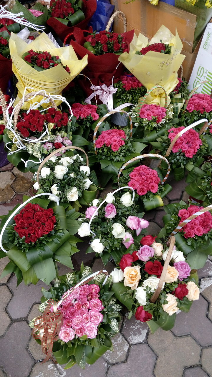 flower, freshness, fragility, growth, variation, beauty in nature, plant, nature, close-up, multi colored, petal, day, springtime, flower head, botany, flower shop, outdoors, in bloom, flower arrangement, abundance, pink color, various, retail, full frame, no people