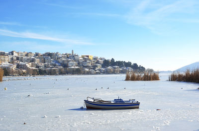 Kastoria in winter with snowy lake orestiada