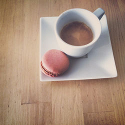 Directly above shot of coffee cup on table