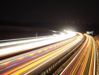 Light trails on road at night