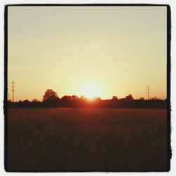 Scenic view of landscape at sunset