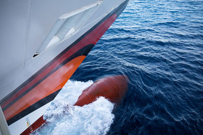 High angle view of ship sailing in sea