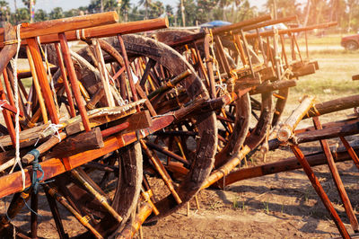 Old rusty wheel on field