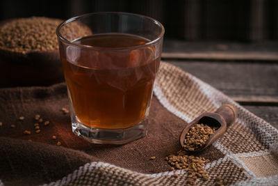 Egyptian fenugreek yellow tea or methi dana drink and fenugreek seeds