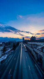 Highway against sky during sunset