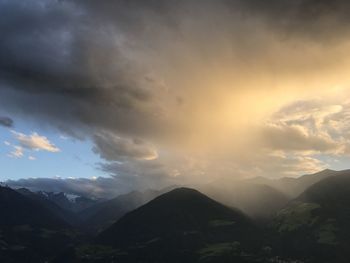 Scenic view of mountains against sky during sunset