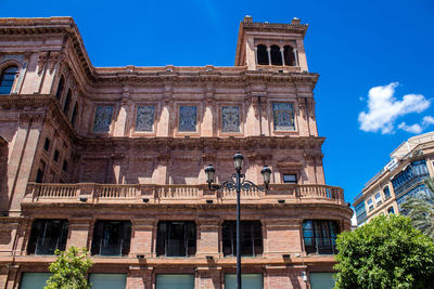 Low angle view of historic building against sky