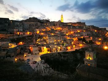 High angle view of illuminated buildings in city