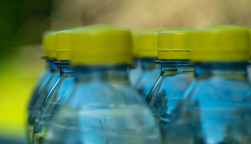 Close-up of glass bottle against blurred background