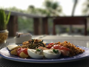 Close-up of salad in plate on table