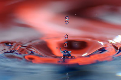 Close-up of water drops falling in sink