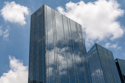 Low angle view of modern buildings against sky