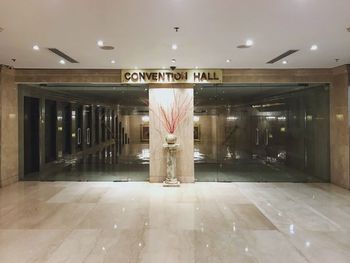 Man in illuminated underground walkway