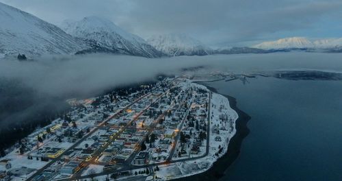 Aerial view of buildings in city during winter