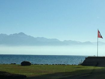 Scenic view of sea against blue sky