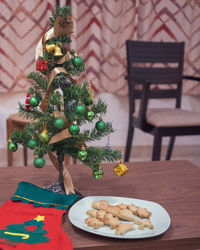 Christmas tree on table at home