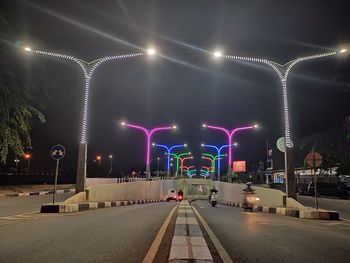 Illuminated street lights at night