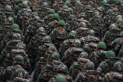 Rear view of army soldiers at parade