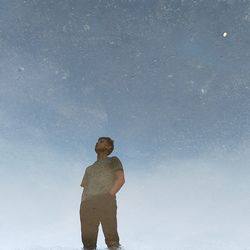 Full length of man standing against sky