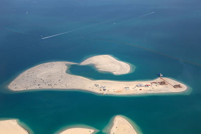 High angle view of swimming pool by sea