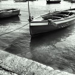 Boats moored in sea