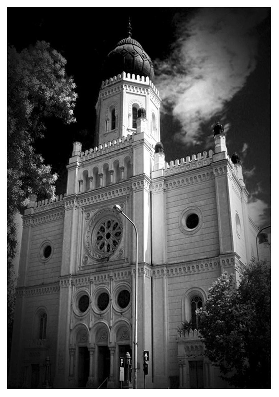 LOW ANGLE VIEW OF BELL TOWER OF CHURCH