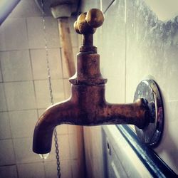Close-up of metallic faucet