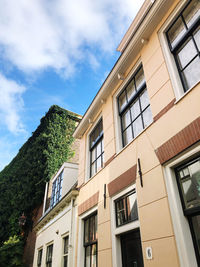 Low angle view of residential building against sky