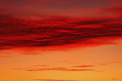 Low angle view of dramatic sky during sunset