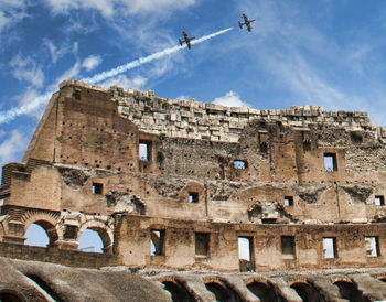 Low angle view of old ruin against sky