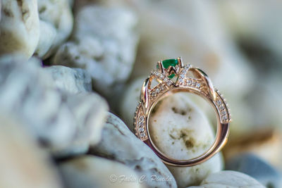 Close-up of hand holding wedding rings