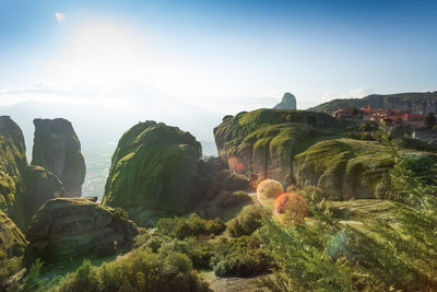 Panoramic view of rocks and mountains against sky