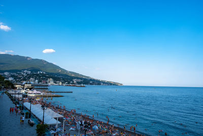 High angle view of sea against blue sky