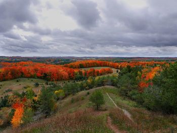 Scenic view of field against sky during autumn