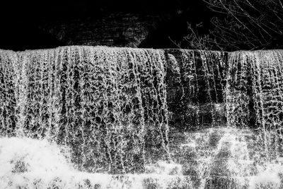 Close-up of splashing water against black background