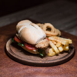 Close-up of burger in plate on table