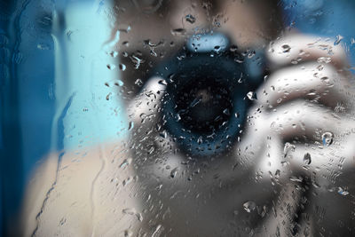 Full frame shot of wet glass window