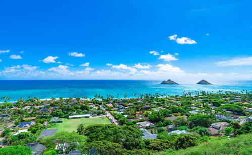 Scenic view of sea against blue sky