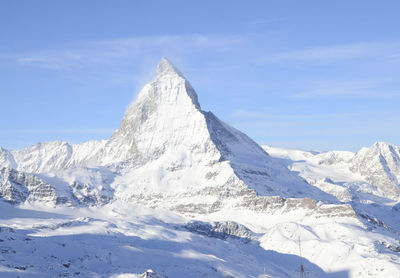 Matterhorn mountain peak covered in snow during christmas in zermatt, switzerland